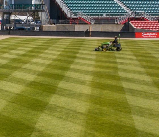 image of stadium grass being mowed